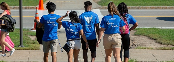 Students walking away from the camera. 