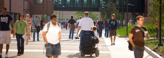 Students walking in Founders plaza. 