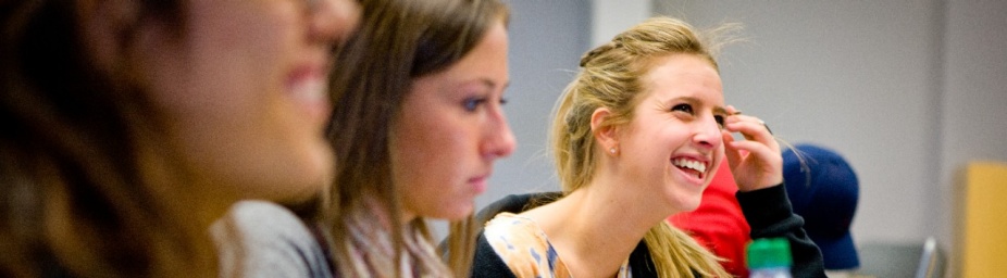 Students sitting in a row. 