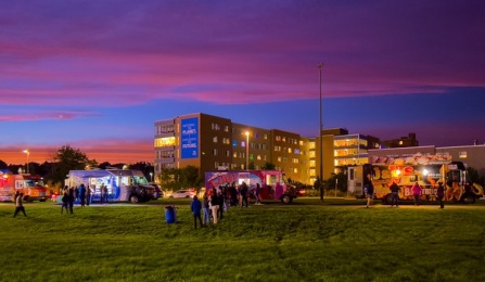 Students line up for the food trucks outside of Greiner Hall. 