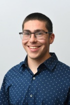 Headshot of Zachary Gluck. 