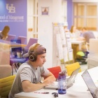 student working at a computer. 