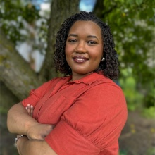 Head shot photo of Madison Allen Kuyenga. 