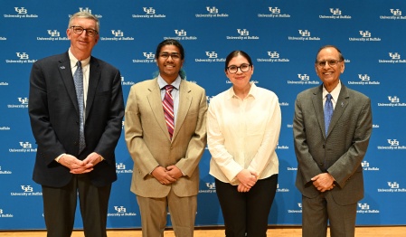 President Satish K. Tripathi and Provost A. Scott Weber pose with awardees at the 2024 Celebration of Academic Excellence. 